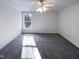 Spacious bedroom with window and plush carpeting at 1004 Cabin Hill Way, Garner, NC 27529