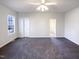 Bright bedroom with ensuite bathroom and plush carpeting at 1004 Cabin Hill Way, Garner, NC 27529