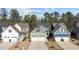 Community of charming two-story townhouses with various colors at 104 Spruce Hollow Cir, Spring Lake, NC 28390