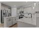 Modern kitchen with island, stainless steel appliances, and granite countertops at 104 Spruce Hollow Cir, Spring Lake, NC 28390