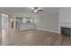 Open living room with kitchen and fireplace views at 104 Spruce Hollow Cir, Spring Lake, NC 28390