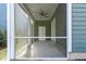 Cozy screened porch, perfect for relaxing outdoors at 104 Spruce Hollow Cir, Spring Lake, NC 28390
