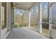 Enjoy the view from this screened porch, overlooking the backyard at 104 Spruce Hollow Cir, Spring Lake, NC 28390