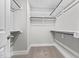 Large walk-in closet with ample shelving and hanging space at 104 Spruce Hollow Cir, Spring Lake, NC 28390