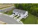 Aerial view showing townhome location and street at 14 Virgo Dr, Angier, NC 27501