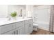Bathroom with double vanity and bathtub at 14 Virgo Dr, Angier, NC 27501