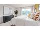 Bright bedroom with king-size bed and dresser at 14 Virgo Dr, Angier, NC 27501
