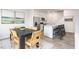 Dining area with a dark wood table, six chairs, and access to backyard at 14 Virgo Dr, Angier, NC 27501