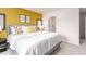 Main bedroom with king-size bed and en-suite bathroom at 14 Virgo Dr, Angier, NC 27501