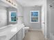 Clean bathroom with a vanity, toilet, and shower/tub combo at 1611 Copper Cir, Mebane, NC 27302