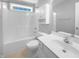 Bathroom with tub, shower, and white cabinetry at 1611 Copper Cir, Mebane, NC 27302