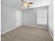 Bedroom with ceiling fan and neutral colored carpet at 1611 Copper Cir, Mebane, NC 27302