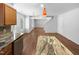 Open concept kitchen with granite countertops and hardwood floors at 1611 Copper Cir, Mebane, NC 27302