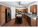 Kitchen with stainless steel appliances and granite countertops at 1611 Copper Cir, Mebane, NC 27302