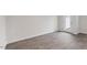 Bright dining room with hardwood floors and access to backyard at 18 Virgo Dr, Angier, NC 27501