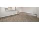 Spacious living room with hardwood floors and lots of natural light at 18 Virgo Dr, Angier, NC 27501