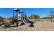 playground with slides, climbing features, and play area at 18 Virgo Dr, Angier, NC 27501