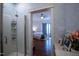 Relaxing bathroom with shower and wallpaper accents, with a bedroom view at 223 N Main St, Wendell, NC 27591