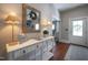 Entryway features a decorative console table with lamps and a decorative mirror at 223 N Main St, Wendell, NC 27591