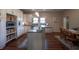 Bright, open kitchen layout with a kitchen island and adjacent dining area at 223 N Main St, Wendell, NC 27591