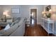 Inviting living room with hardwood floors, comfortable seating, and natural light at 223 N Main St, Wendell, NC 27591