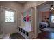 Convenient mudroom with storage, built-in bench, and view of the bedroom at 223 N Main St, Wendell, NC 27591