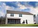 Large backyard with a screened-in porch at 241 Fair Oaks Ct, Mebane, NC 27302