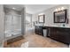 Bathroom with a tiled floor, double sinks, and a separate shower and tub at 241 Fair Oaks Ct, Mebane, NC 27302