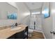 Bathroom with granite vanity, glass shower, and updated fixtures at 241 Fair Oaks Ct, Mebane, NC 27302