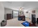 Comfortable bedroom with natural light and neutral paint, as well as a ceiling fan at 241 Fair Oaks Ct, Mebane, NC 27302