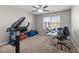 Bedroom featuring a ceiling fan, desk, and exercise equipment at 241 Fair Oaks Ct, Mebane, NC 27302