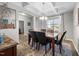 Bright dining room with coffered ceiling and a view to the kitchen at 241 Fair Oaks Ct, Mebane, NC 27302