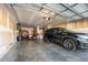 Garage with a car and storage shelves at 241 Fair Oaks Ct, Mebane, NC 27302