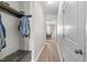 Bright hallway with coat rack and bench, leading to the dining room at 241 Fair Oaks Ct, Mebane, NC 27302