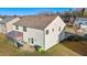 Rear view of two-story house, showcasing screened porch at 241 Fair Oaks Ct, Mebane, NC 27302