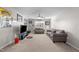 Spacious living room with neutral paint, plush carpet, ceiling fan, and tons of natural light at 241 Fair Oaks Ct, Mebane, NC 27302