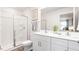 Bathroom with double vanity, large shower, and toilet at 28 Virgo Dr, Angier, NC 27501