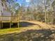Spacious backyard with deck and fire pit at 341 Harts Creek Dr Dr, Pittsboro, NC 27312