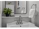 Small bathroom with a pedestal sink and modern fixtures at 341 Harts Creek Dr Dr, Pittsboro, NC 27312