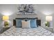Bright bedroom with patterned bedding and stylish decor at 341 Harts Creek Dr Dr, Pittsboro, NC 27312