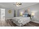 Spacious bedroom with wood-look floors and ceiling fan at 341 Harts Creek Dr Dr, Pittsboro, NC 27312