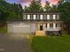 Two-story home with attached garage and front porch at 341 Harts Creek Dr Dr, Pittsboro, NC 27312