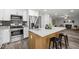 Kitchen with island, stainless steel appliances, and wood flooring at 341 Harts Creek Dr Dr, Pittsboro, NC 27312