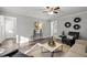 Living room with wood flooring, comfy seating, and stylish decor at 341 Harts Creek Dr Dr, Pittsboro, NC 27312
