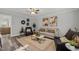 Open living room with a view into the kitchen at 341 Harts Creek Dr Dr, Pittsboro, NC 27312