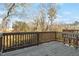 Wooden deck overlooking wooded area, offering peaceful views at 386 Cotton Brook Dr, Fuquay Varina, NC 27526