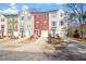 Townhome with multiple colors, two-car garage, and driveway at 386 Cotton Brook Dr, Fuquay Varina, NC 27526