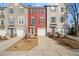 Three-story townhome with attached garage and curb appeal at 386 Cotton Brook Dr, Fuquay Varina, NC 27526