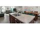 Modern kitchen with granite countertops and island at 386 Cotton Brook Dr, Fuquay Varina, NC 27526