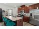 Modern kitchen with stainless steel appliances and ample cabinetry at 386 Cotton Brook Dr, Fuquay Varina, NC 27526